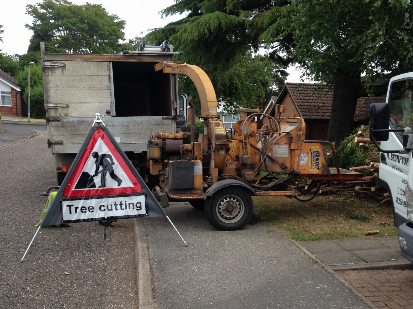 truck chipper Truck with sign